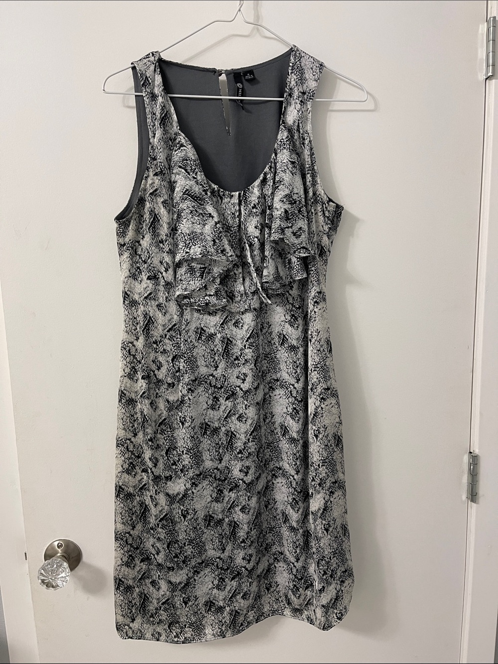 Sleeveless Black & White Ruffle Front Dress